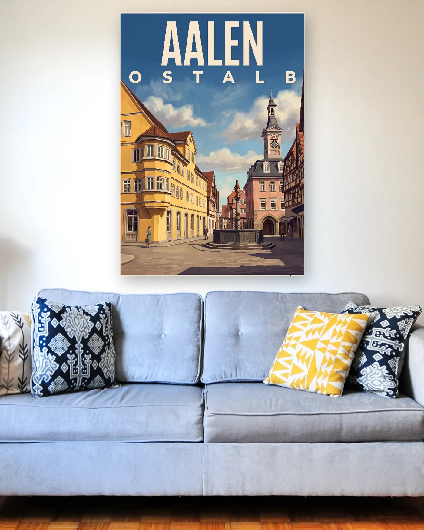 Aalen-Poster mit dem Motiv Marktplatz im malerischen Stil über einem hellblauen Sofa